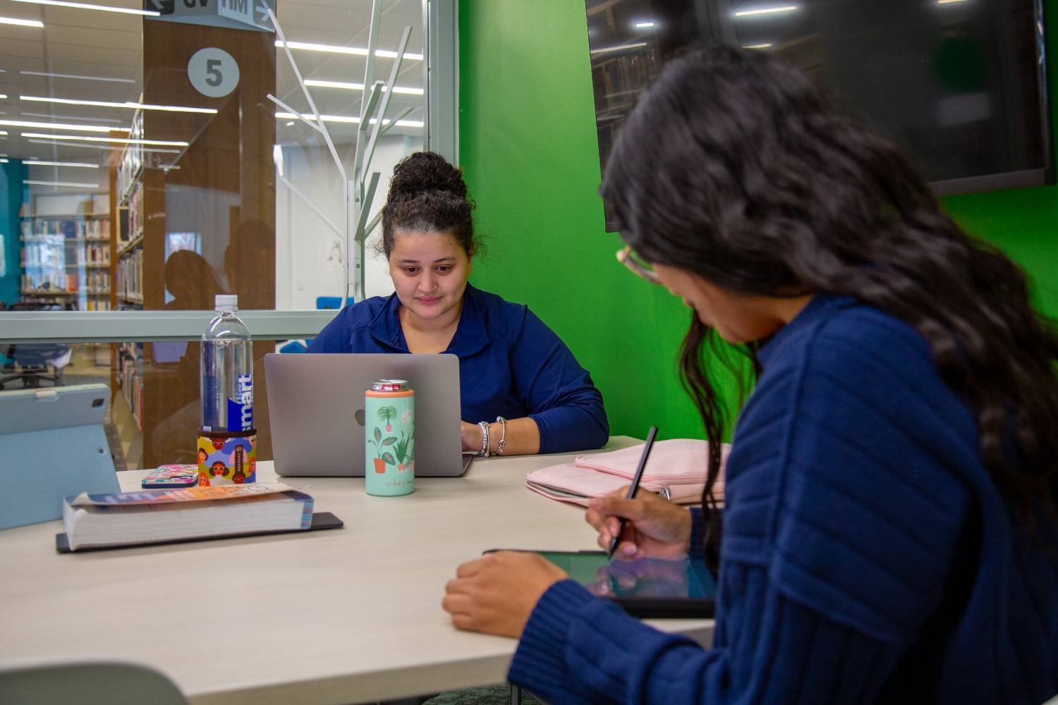 students testing in green room